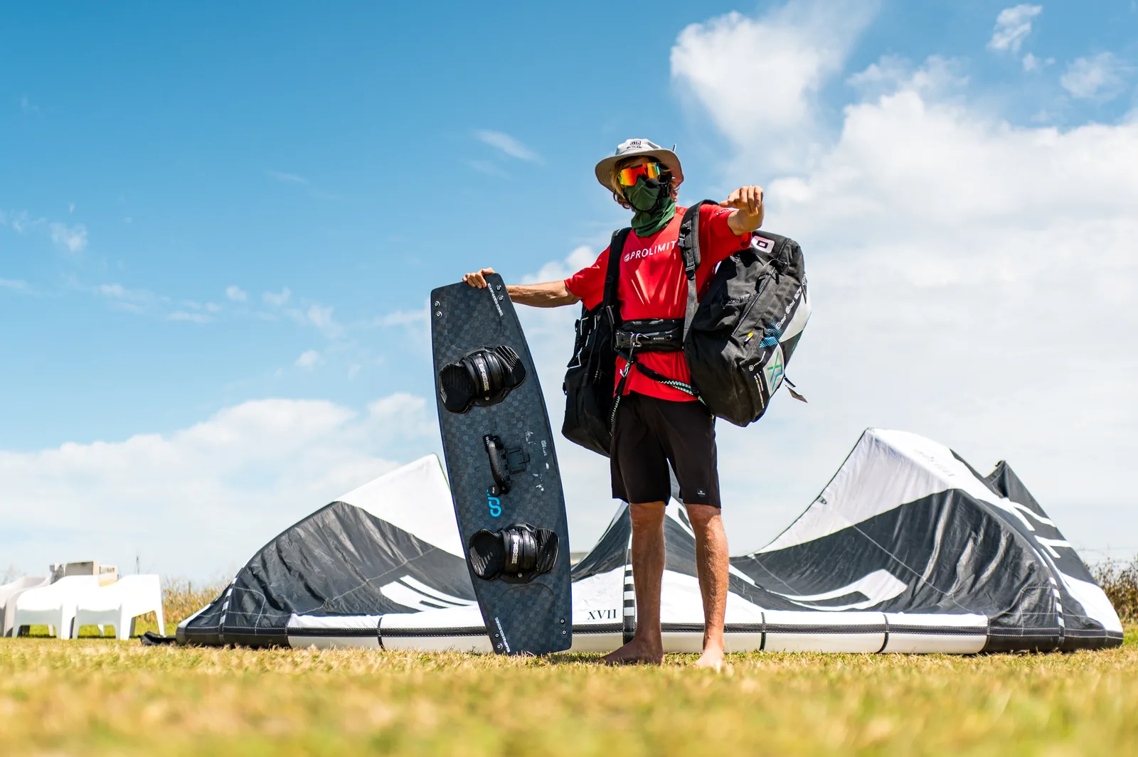 Wojciech Stopa with a kiteboard and kite in Sicily